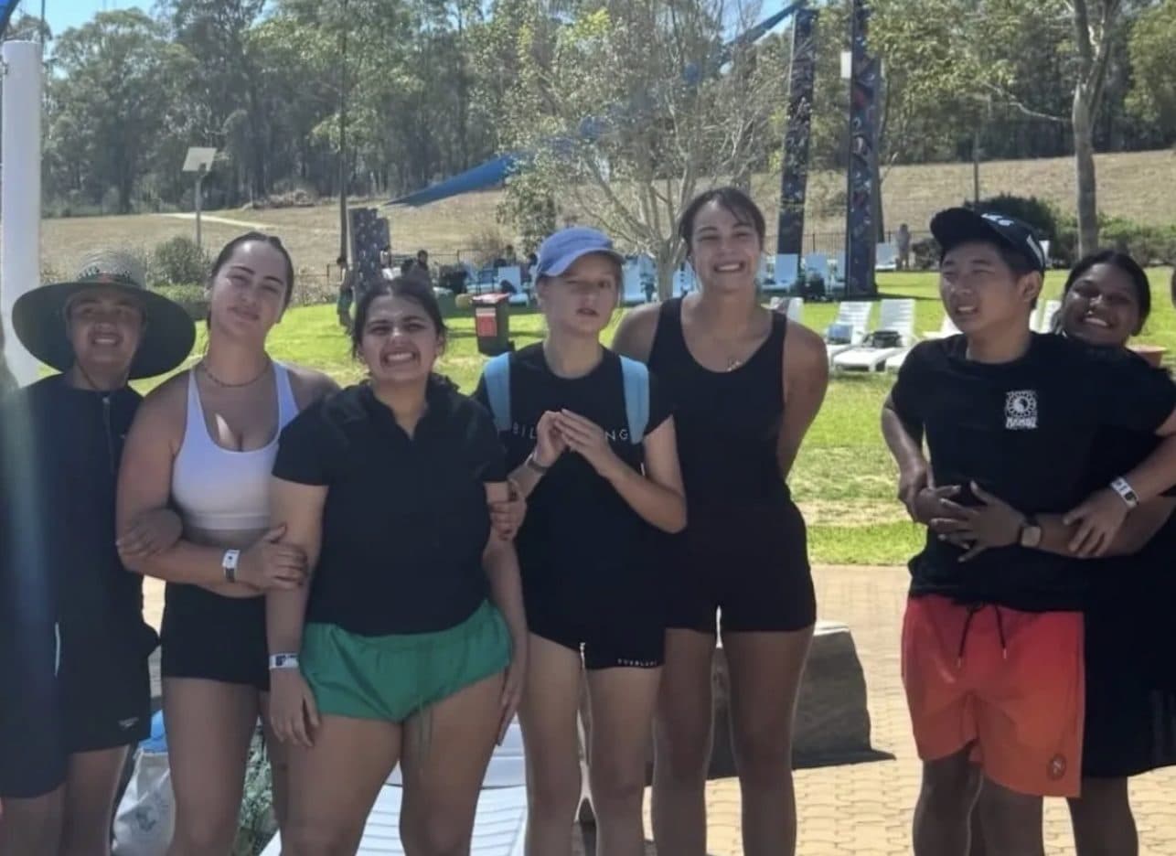 The Waves support team together at a park day